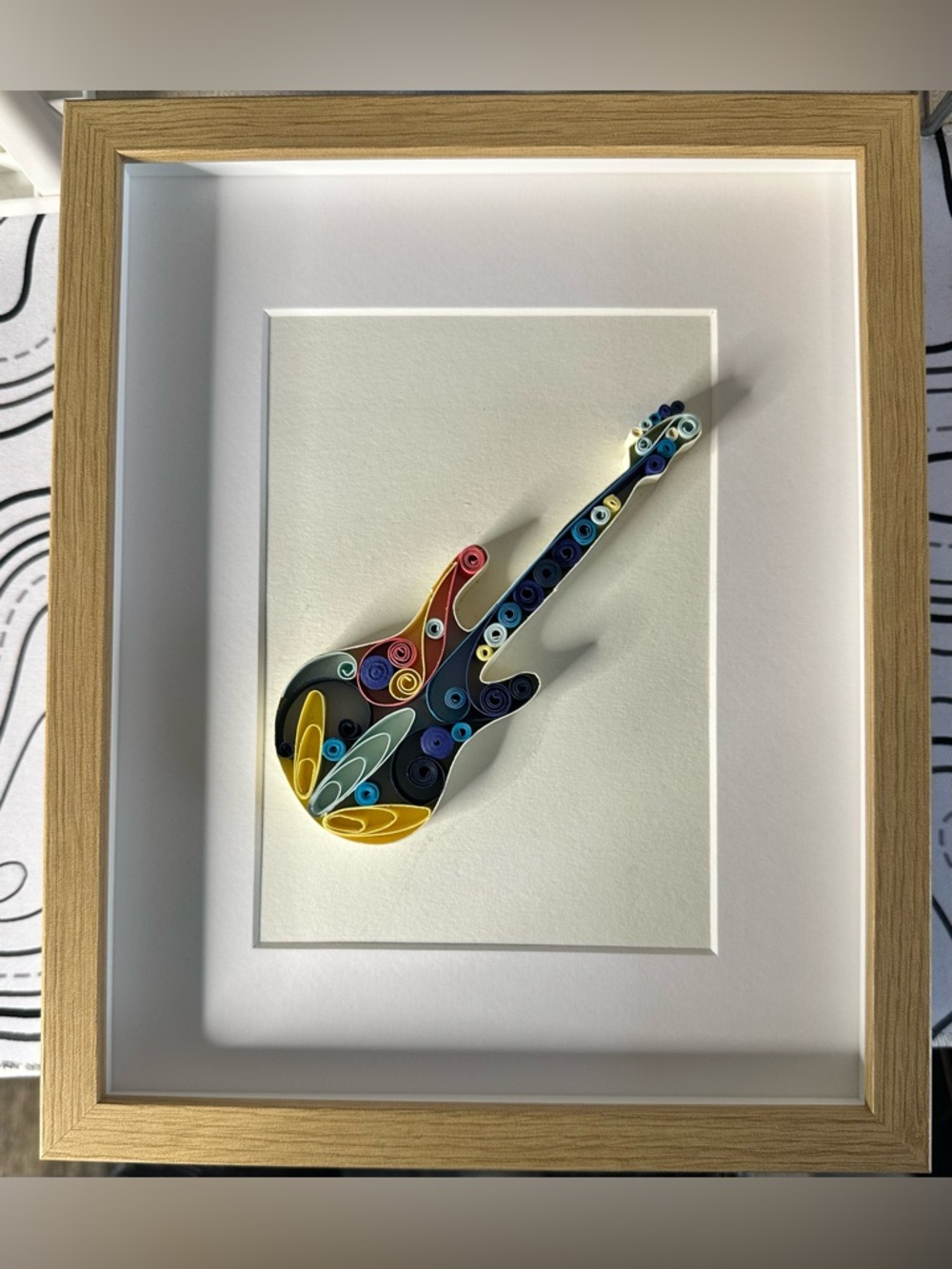 Framed handmade guitar quilling art.